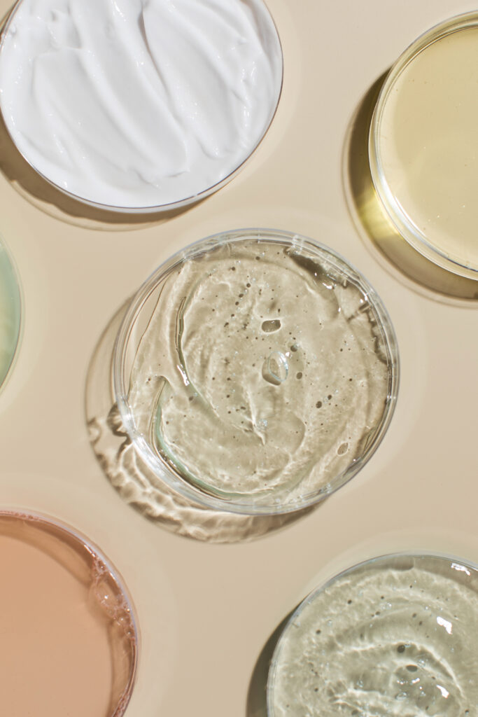 various cosmetic products in petri dishes on beige 2026 01 08 05 27 27 utc